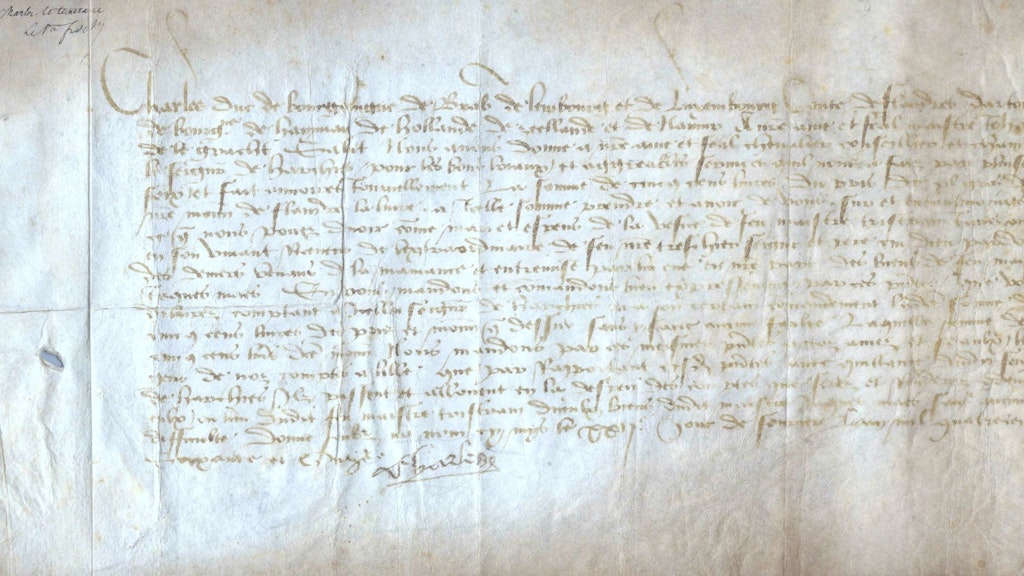 L’immagine mostra una lettera manoscritta rettangolare.