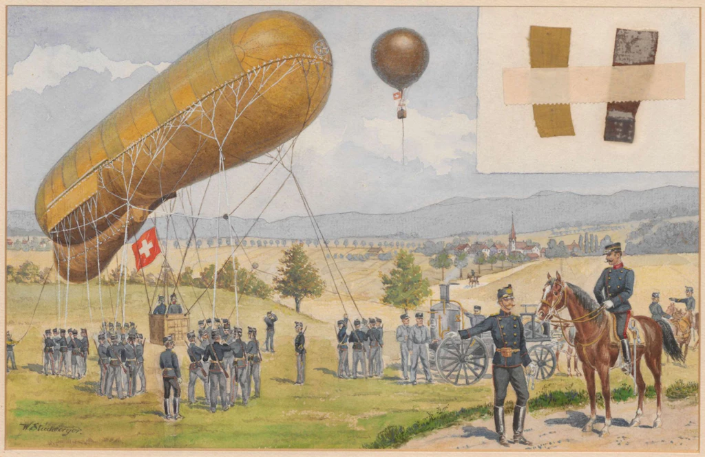 Dieses Aquarell von Wilhelm Friedrich Stückelberger diente als Vorlage für eine Militärpostkarte der Ballontruppe. Zu sehen sind neben der Truppe ein Drachen- und ein Kugelballon in der Luft. Die beiden Stoffmuster in der rechten Bildecke dienten der Farbgebung. (Entstanden kurz nach 1900; BiG H 247)