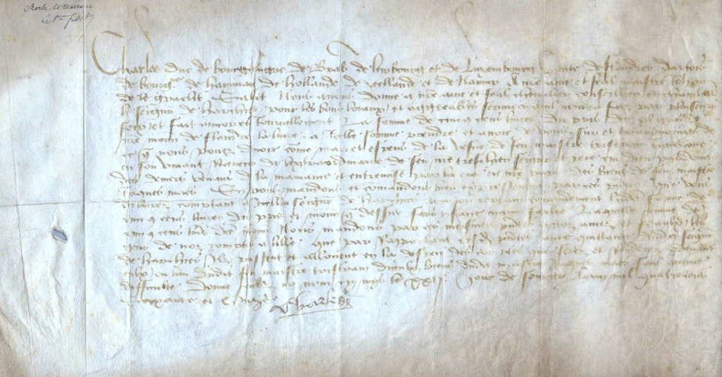 L’immagine mostra una lettera manoscritta rettangolare.